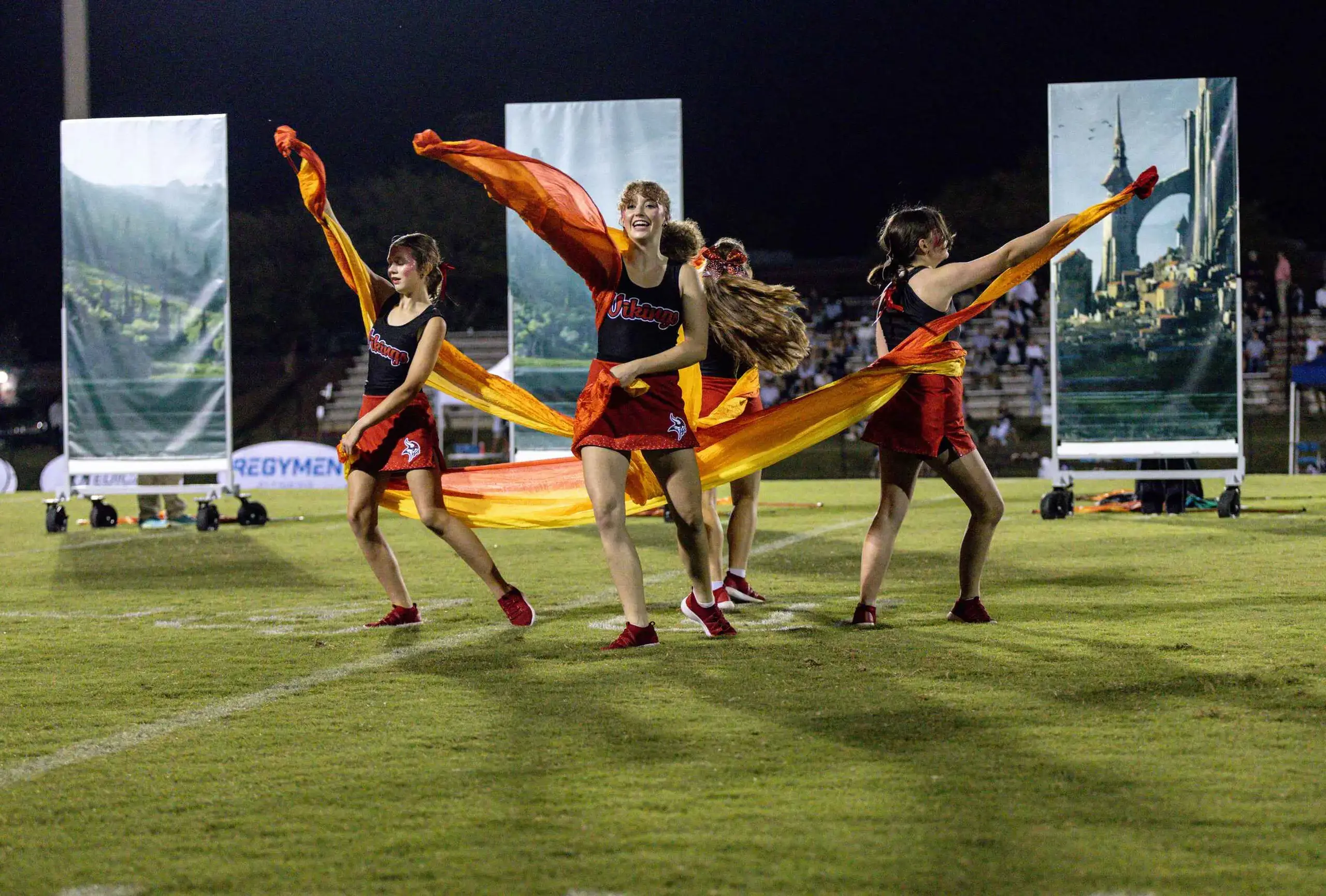 Colorguard performs at the halftime of the home Viking Football game.