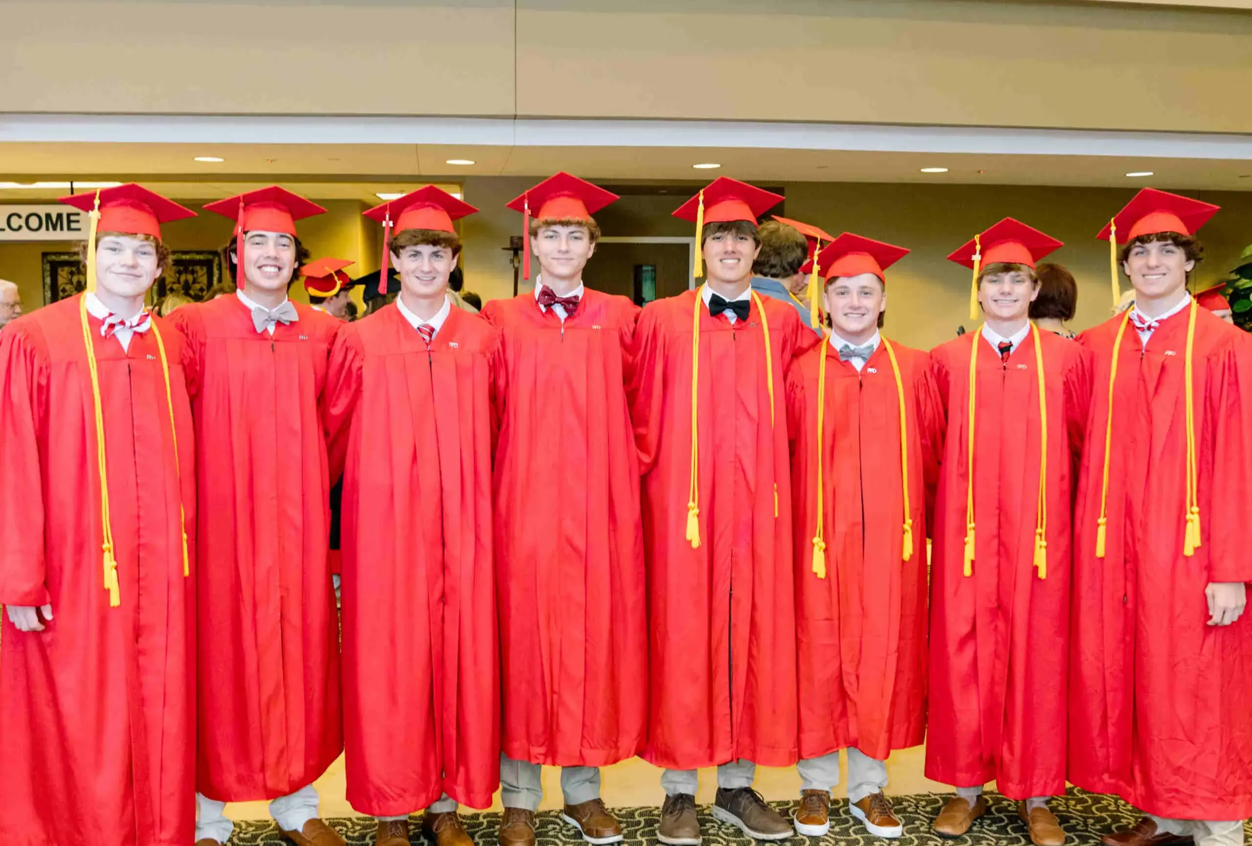 Class of 2024 poses in the regalia. 