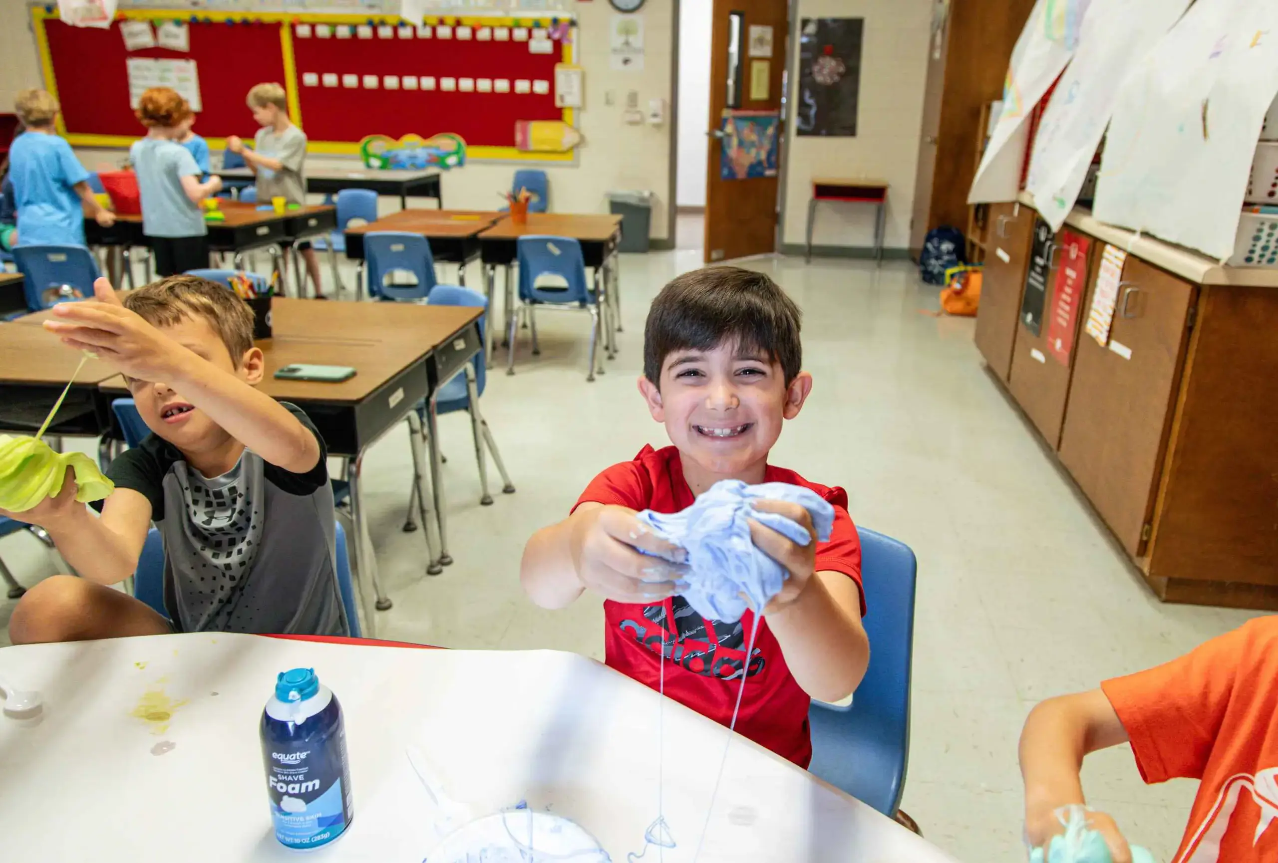 Students at camp making slime.