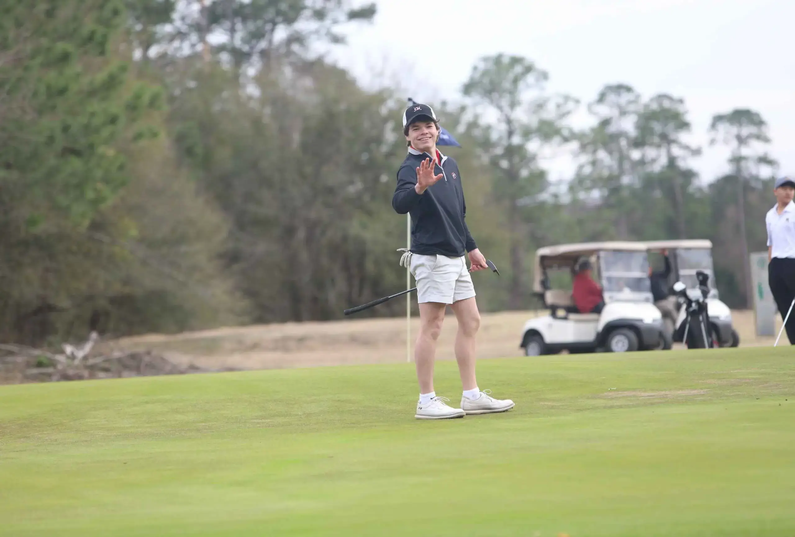 Golfer Waving