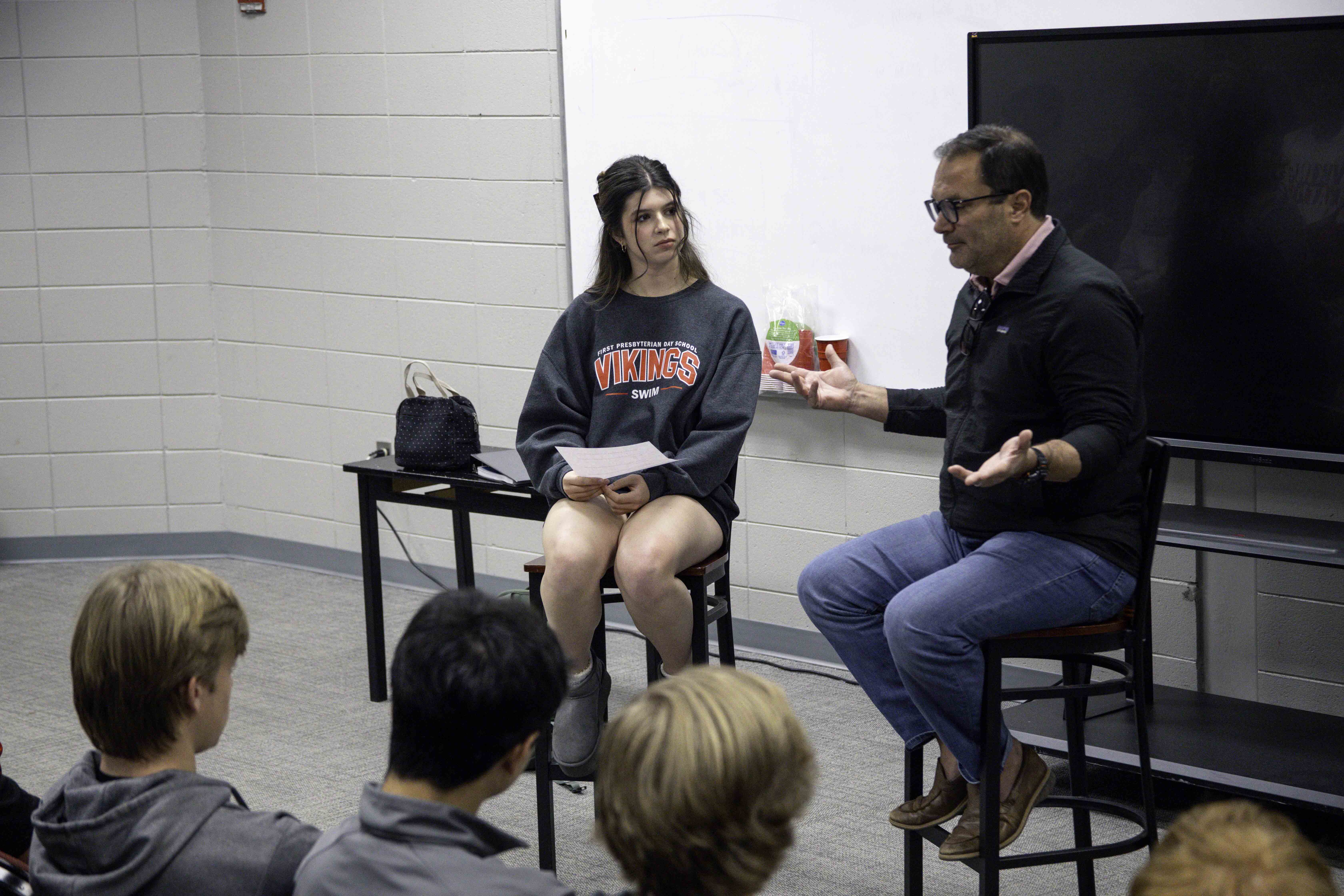 FPD students leading a Business Club discussion