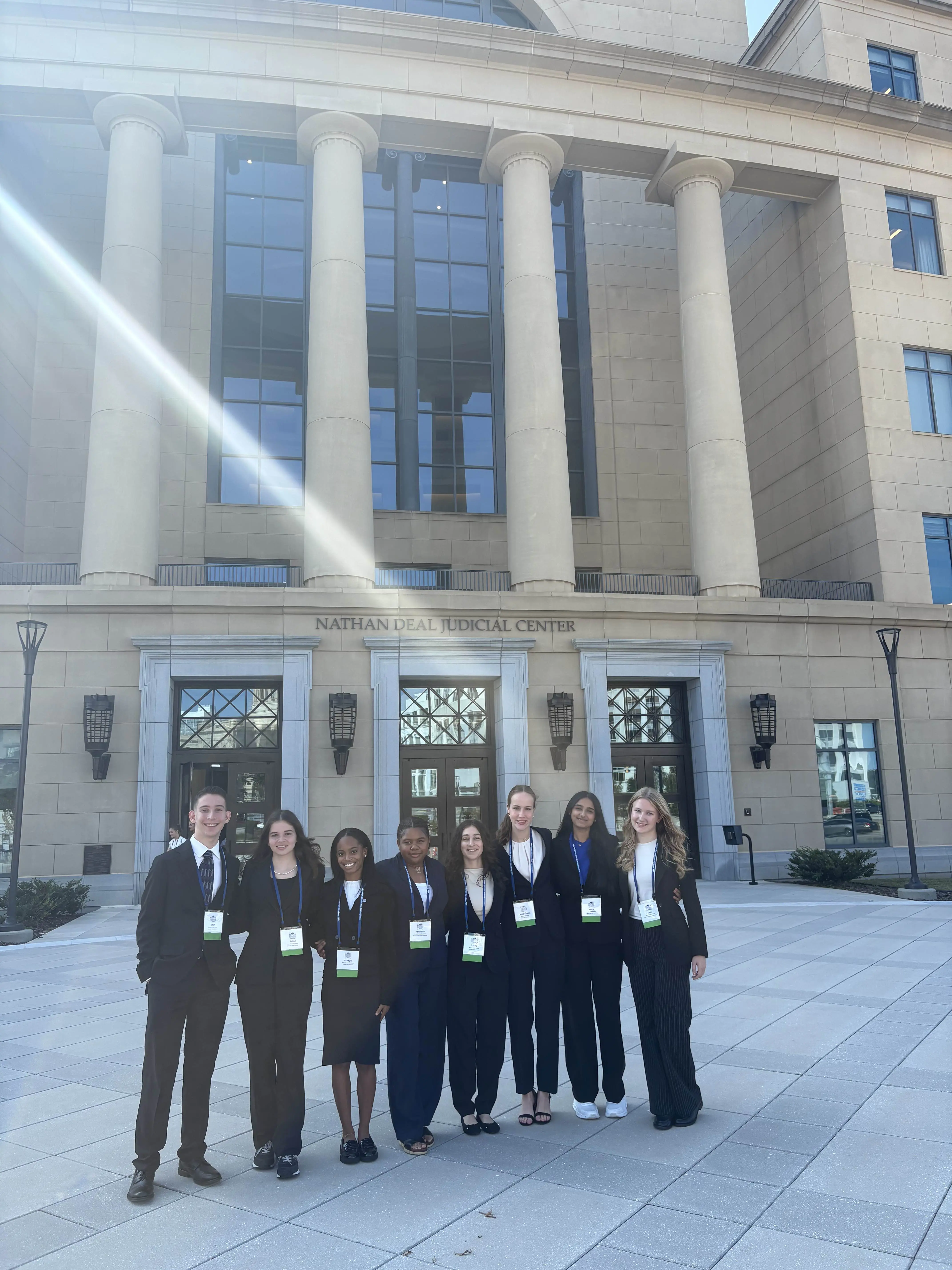High school student presenting at mock trial academy