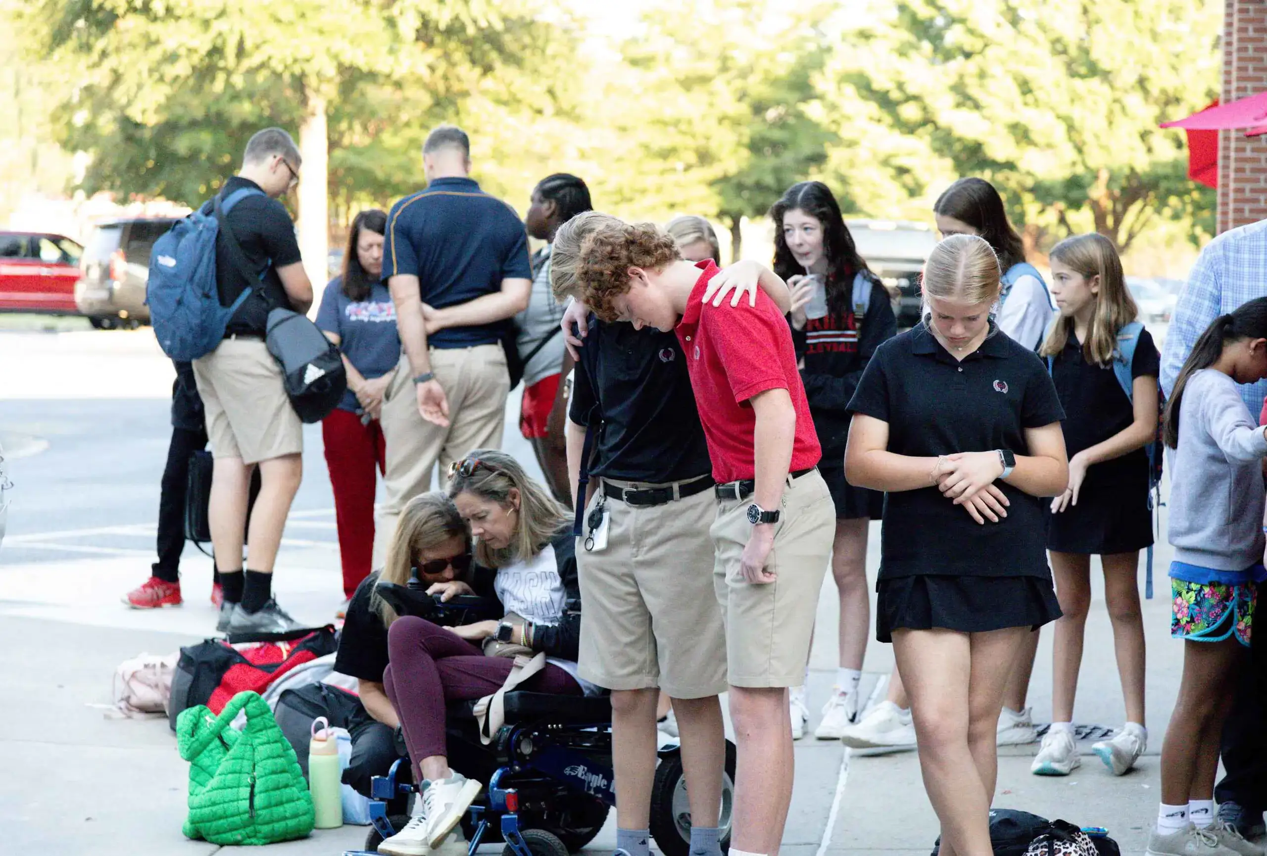 Students praying at See you at the Pole.